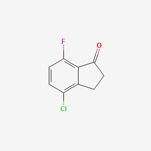 Chemical structure of 4-Chloro-7-fluoro-2,3-dihydro-1H-inden-1-one