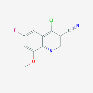 Chemical structure of 4-Chloro-6-fluoro-8-methoxyquinoline-3-carbonitrile