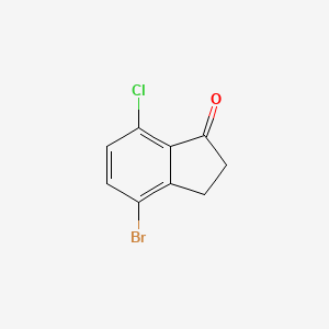 Chemical structure of 4-Bromo-7-chloro-2,3-dihydro-1H-inden-1-one