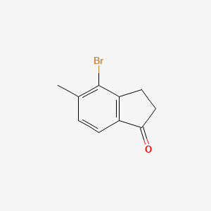 Chemical structure of 4-Bromo-5-methyl-2,3-dihydro-1H-inden-1-one