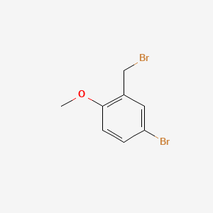 Chemical structure of 4-Bromo-2-(bromomethyl)-1-methoxybenzene