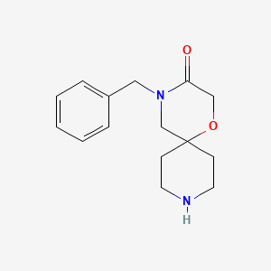 Chemical structure of 4-Benzyl-1-oxa-4,9-diazaspiro[5.5]undecan-3-one