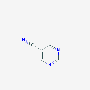Chemical structure of 4-(2-Fluoro-2-propyl)pyrimidine-5-carbonitrile
