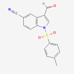 Chemical structure of 3-formyl-1-tosyl-1H-indole-5-carbonitrile