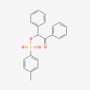 Chemical structure of 2-Phenyl-2-(p-toluenesulfonyloxy)acetophenone