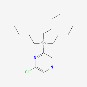 Chemical structure of 2-Chloro-4-(tributylstannyl)pyrimidine