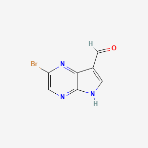 Chemical structure of 2-Bromo-5H-pyrrolo[2,3-b]pyrazine-7-carbaldehyde