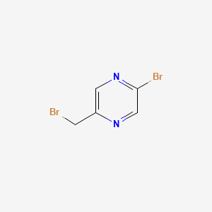 Chemical structure of 2-Bromo-5-(bromomethyl)pyrazine