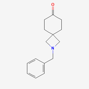 Chemical structure of 2-Benzyl-2-azaspiro[3.5]nonan-7-one