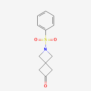 Chemical structure of 2-(Phenylsulfonyl)-6-oxo-2-azaspiro[3.3]heptane