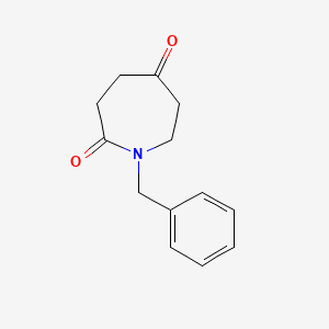 Chemical structure of 1-Benzylazepane-2,5-dione