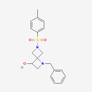 Chemical structure of 1-Benzyl-6-tosyl-1,6-diazaspiro[3.3]heptan-3-ol