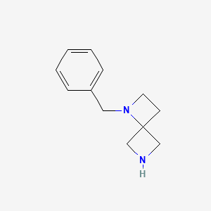 Chemical structure of 1-Benzyl-1,6-diazaspiro[3.3]heptane hemioxalate