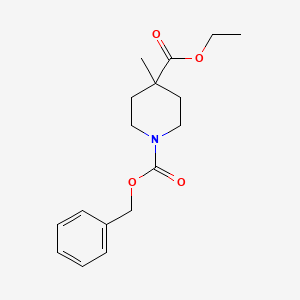 Chemical structure of 1-benzyl 4-ethyl 4-methylpiperidine-1,4-dicarboxylate