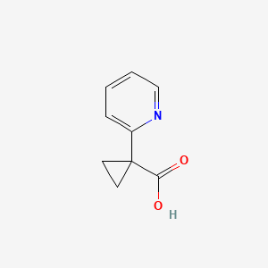 Chemical structure of 1-(Pyridin-2-yl)cyclopropanecarboxylic acid