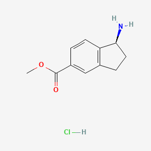 Chemical structure of (S)-Methyl 1-amino-2,3-dihydro-1H-indene-5-carboxylate hydrochloride