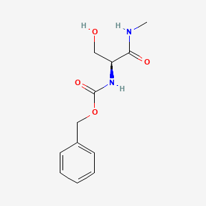 Chemical structure of (S)-Benzyl (3-hydroxy-1-(methylamino)-1-oxopropan-2-yl)carbamate