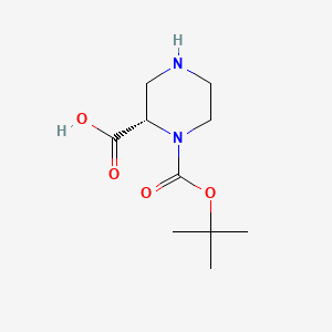 Chemical structure of (S)-1-(tert-Butoxycarbonyl)piperazine-2-carboxylic acid