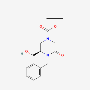 Chemical structure of (R)-1-Boc-4-benzyl-3-(hydroxymethyl)-5-oxopiperazine