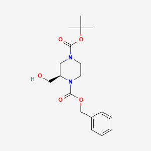 Chemical structure of (R)-4-Benzyl 1-tert-butyl 2-(hydroxymethyl)piperazine-1,4-dicarboxylate