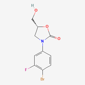 Chemical structure of (R)-3-(4-Bromo-3-fluorophenyl)-5-(hydroxymethyl)oxazolidin-2-one