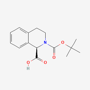 Chemical structure of (R)-2-(tert-Butoxycarbonyl)-1,2,3,4-tetrahydroisoquinoline-1-carboxylic acid